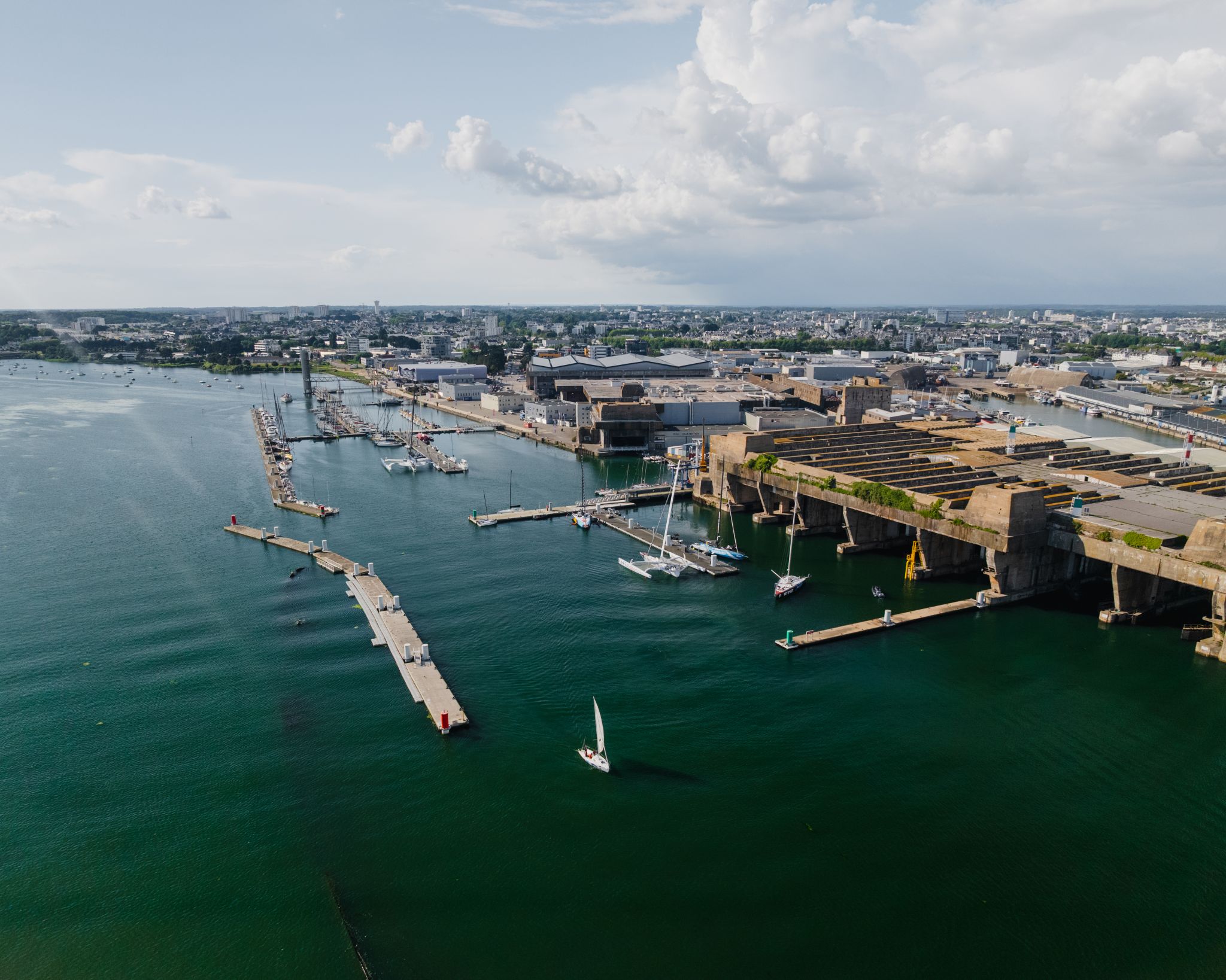Vue aérienne du pôle course au large, port à Lorient La Base (Morbihan) - ©Thibault Poriel - LBST